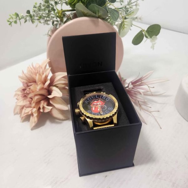 GOLD NIXON ROLLING STONES WATCH #GN346062