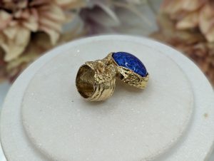 Ladies Yves Saint Laurent Gold Metal and Blue Stone Dress Ring - BP385321-1