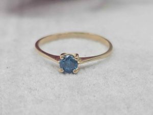 Ladies 14ct Yellow Gold Ring with Light Blue Stone - BL394534