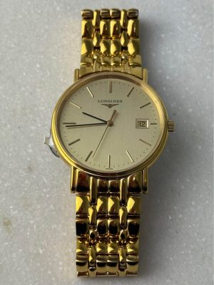 Gold longines watch comes in box #GN379674