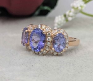 Valuated Ladies 14ct Rose Gold Tanzanite and Diamond Ring (4.64gms) - BL377535