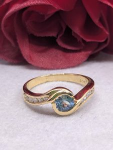 Ladies 18ct Gold Ring with Faux Blue Zircon & Diamonds - BL390596
