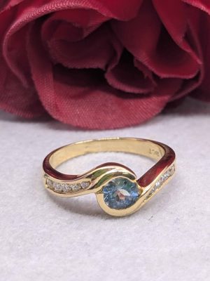 Ladies 18ct Gold Ring with Faux Blue Zircon & Diamonds - BL390596