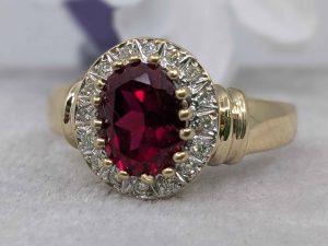 Ladies 9ct Yellow Gold Ring with Red Stone and Diamonds (5.2gms) - BL431435