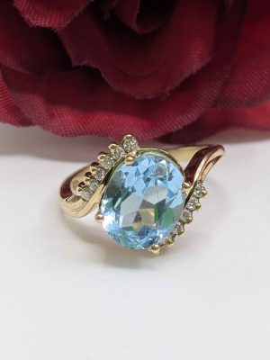 Ladies 9ct Yellow Gold Blue Accented Solitaire Ring - BL448423